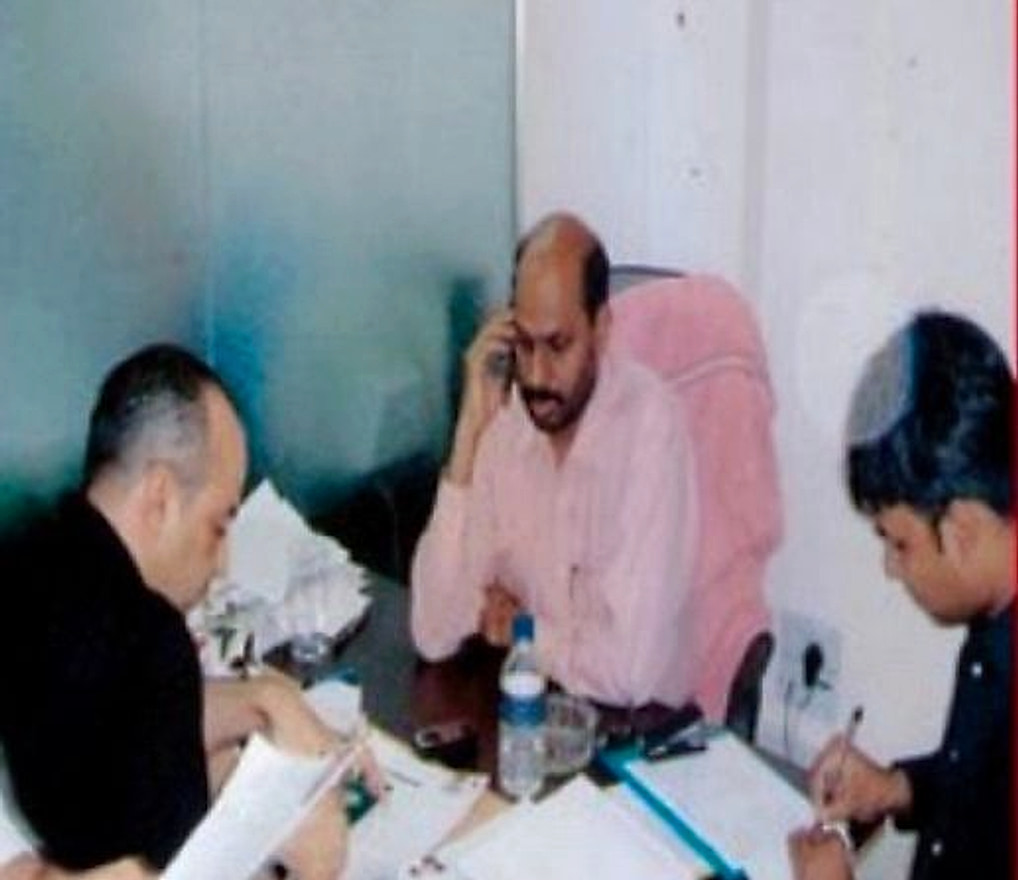 Employer representatives reviewing candidate files